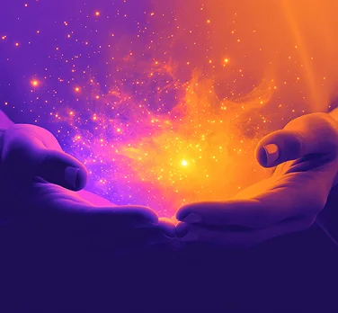 Hands offering a field of glowing stars